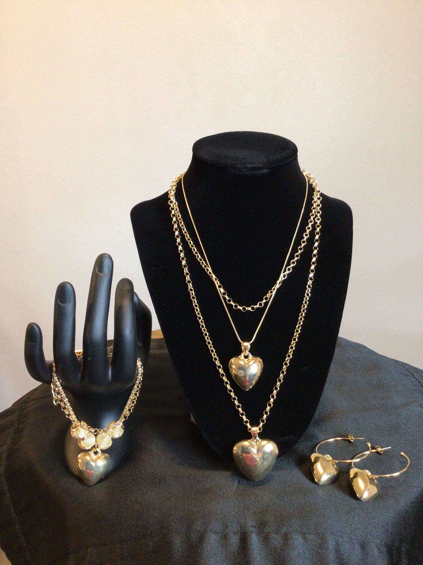 Jewelry - Gold heart jewelry set includes: Gold heart 3 chain necklace, 2 chain bracelet. heart earrings.